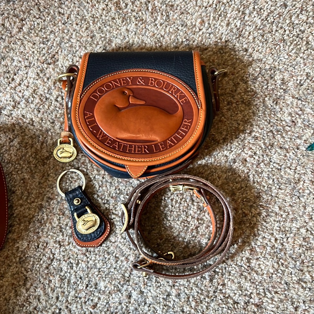 Small Navy and Tan Dooney and Bourke Purse with Key Chain